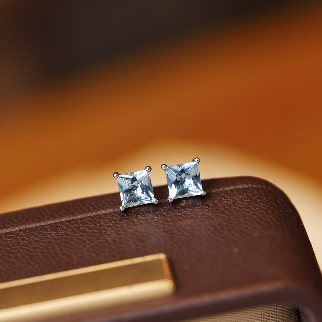 14k Gold 0.7 Ct Natural Aquamarine Earrings: Ref:231082079 // gold content:14k gold // main gemstone:aquamarine // shape:princess // carat weight:0. 7ct // color:blue // treatment:natural // High Estimate: 2000 Low Estimate: 1300 Condition: New