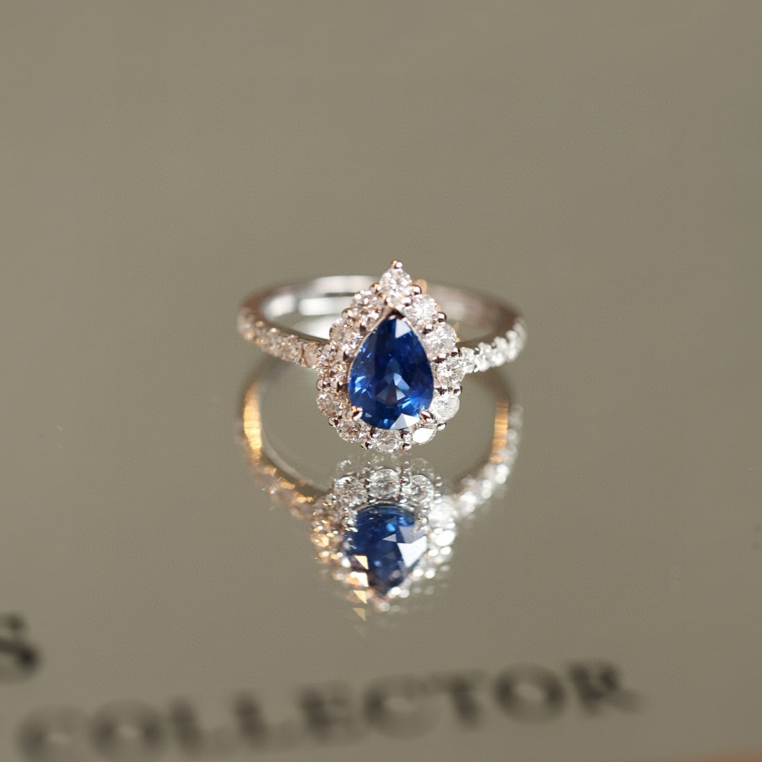 14k Gold 2.16 Ctw Natural Sapphire & Diamond Ring: Ref:231082113 // gold content:14k gold // ring size:7. 25us // // main gemstone:sapphire // shape:pear // carat weight:1. 35ct // color:blue // treatment:natural // // adjacent gemstone 2 : diamond