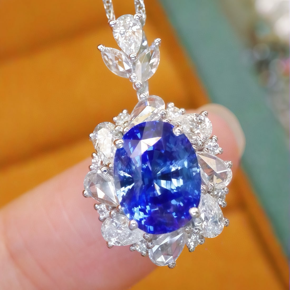 14k Gold 3.80 Ctw Natural Sapphire & Diamond Pendant( Without Chain ): Ref:231082158 // gold content:14k gold // main gemstone:sapphire // shape:oval // carat weight:3. 05ct // color:blue // treatment:natural // // adjacent gemstone 2 : diamond // number of stones:19 // 