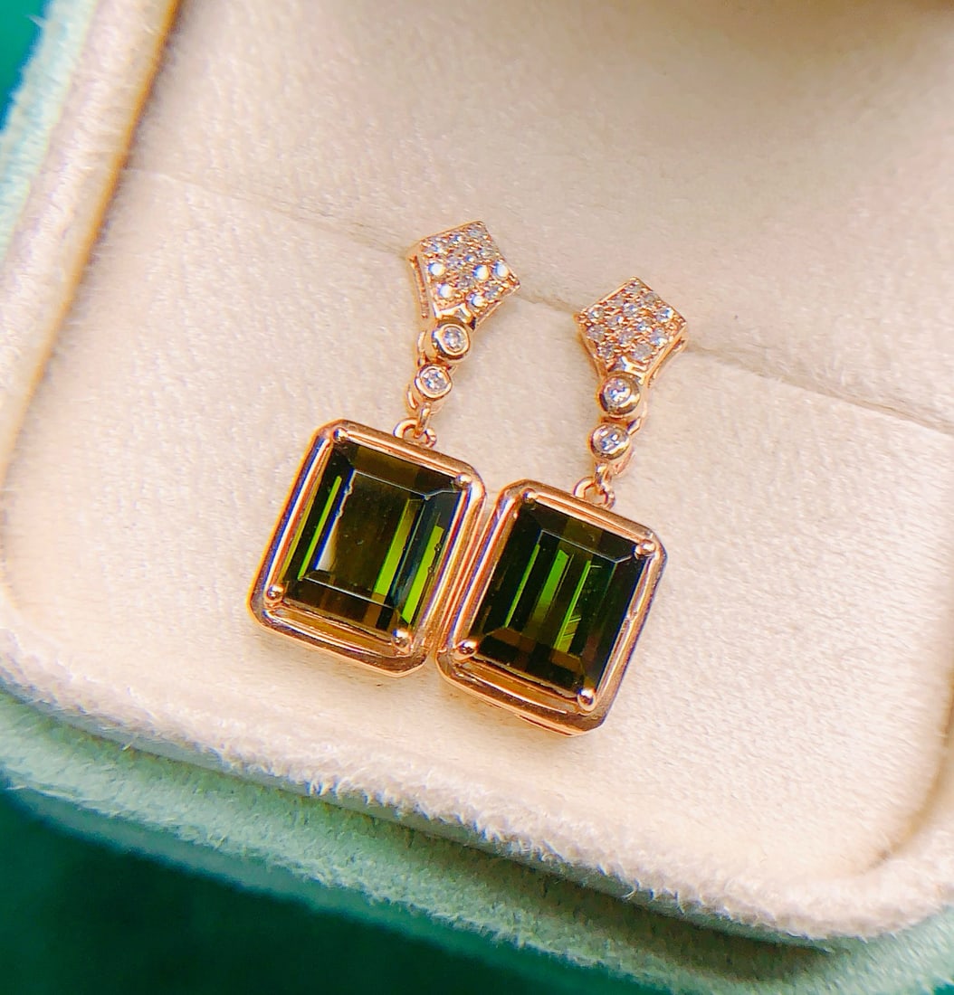 14k Gold 1.49 Ctw Natural Tourmaline & Diamond Earrings: Ref:231082180 // gold content:14k gold // main gemstone:tourmaline // shape:octagonal // carat weight:1. 45ct // color:green // treatment:natural // // adjacent gemstone 2 : diamond // number of