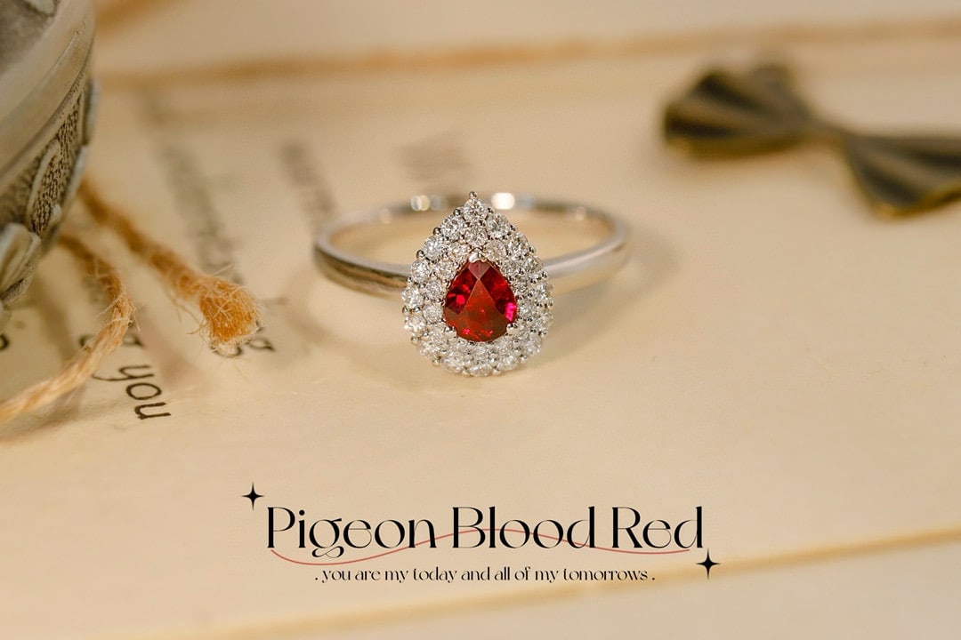 14k Gold 0.57 Ctw Natural Ruby & Diamond Ring: Ref:231082189 // gold content:14k gold // ring size:7. 25us // // main gemstone:ruby // shape:pear // carat weight:0. 30ct // color:red // treatment:natural // // adjacent gemstone 2 : diamond //