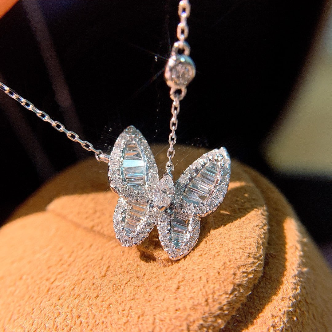 14k Gold 0.6 Ct Natural H Diamond & Butterfly Necklace: Ref:231082193 // gold content:14k gold // main gemstone:diamond // shape:multiple // carat weight:0. 6ct // clarity grade:vs-si // color:h // treatment:natural // Low Estimate: 3300 Condition: New