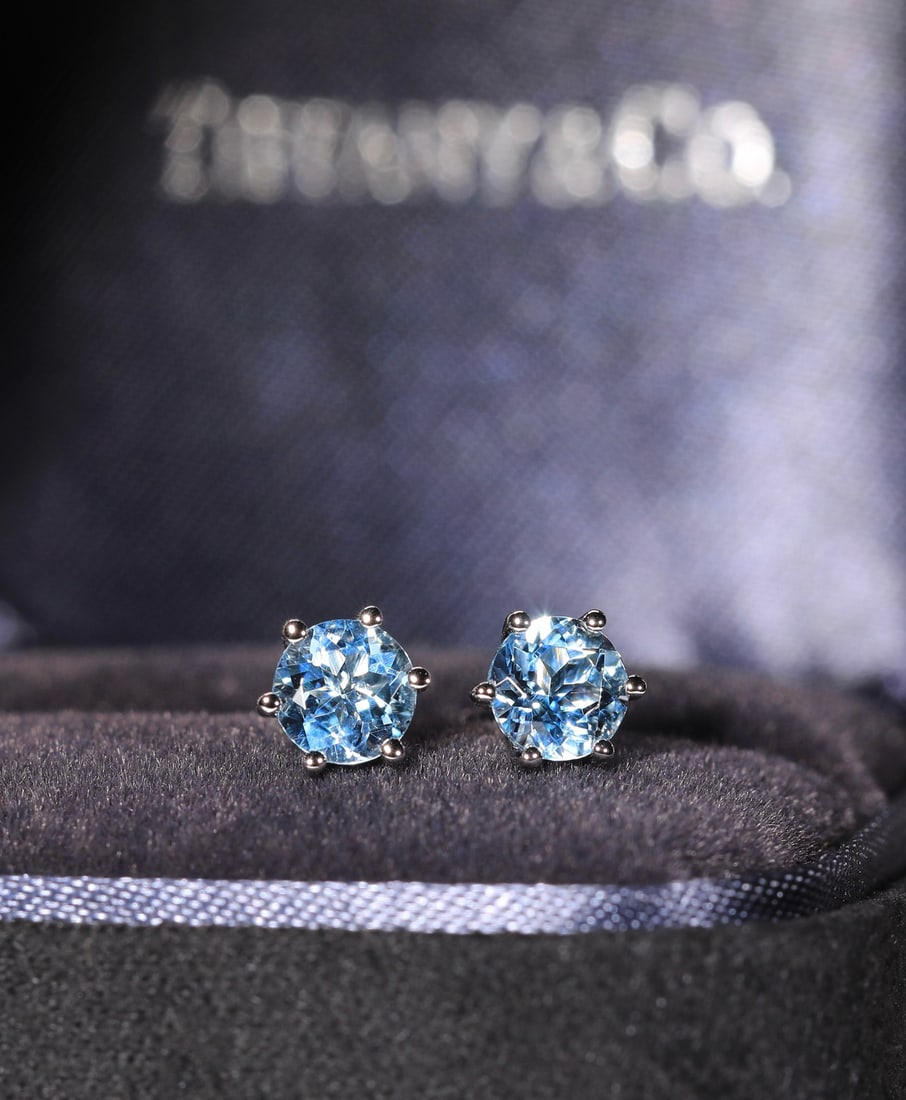 14k Gold 1.17 Ct Natural Aquamarine Earrings: Ref:231082201 // gold content:14k gold // main gemstone:aquamarine // shape:round // carat weight:1. 17ct // color:blue // treatment:natural // cut grade:g // Low Estimate: 2400 Condition: New High