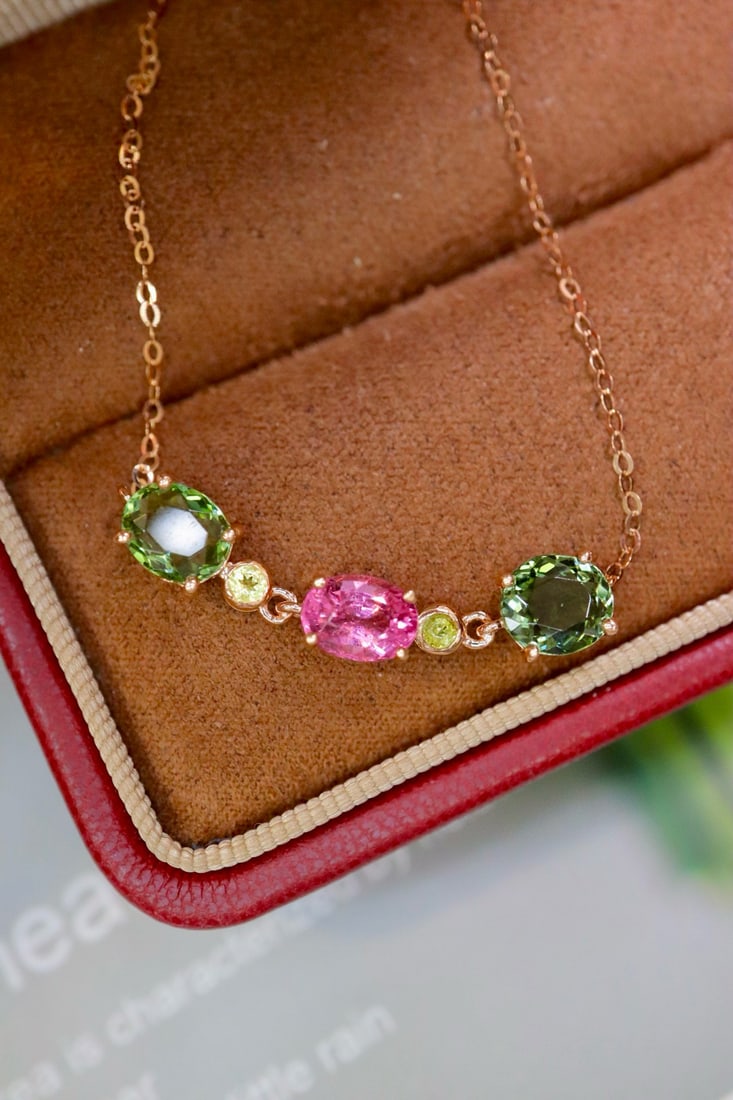 14k Gold 3.3 Ct Natural Tourmaline Necklace: Ref:231082218 // gold content:14k gold // main gemstone:tourmaline // shape:oval // carat weight:3. 3ct // color:color // treatment:natural // High Estimate: 4300 Condition: New Low Estimate: 2900