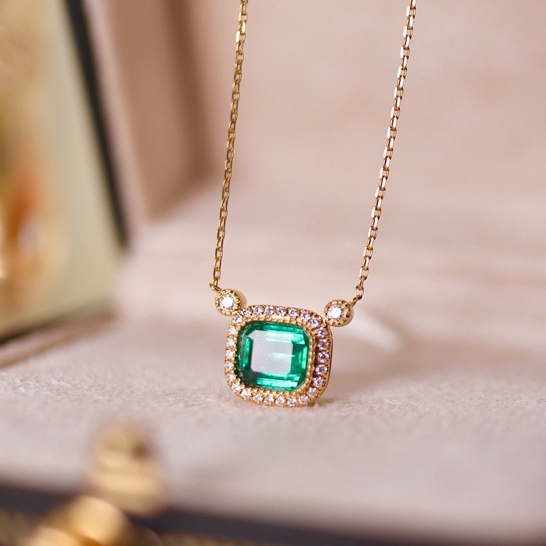 14k Gold 1.33 Ctw Vivid Green Natural Emerald & Diamond Necklace: Ref:231082300 // gold content:14k gold // main gemstone:emerald // shape:octagonal // carat weight:1. 16ct // color:vivid green // treatment:natural // // adjacent gemstone 2 : diamond // shape:round 