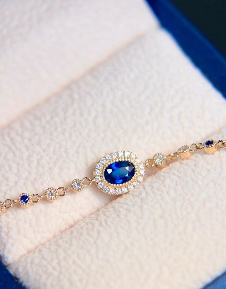 14k Gold 0.76 Ctw Natural Sapphire & Diamond Bracelet: Ref:231082313 // gold content:14k gold // main gemstone:sapphire // shape:oval // carat weight:0. 55ct // color:royal blue // treatment:natural // // adjacent gemstone 2 : diamond // shape:round //
