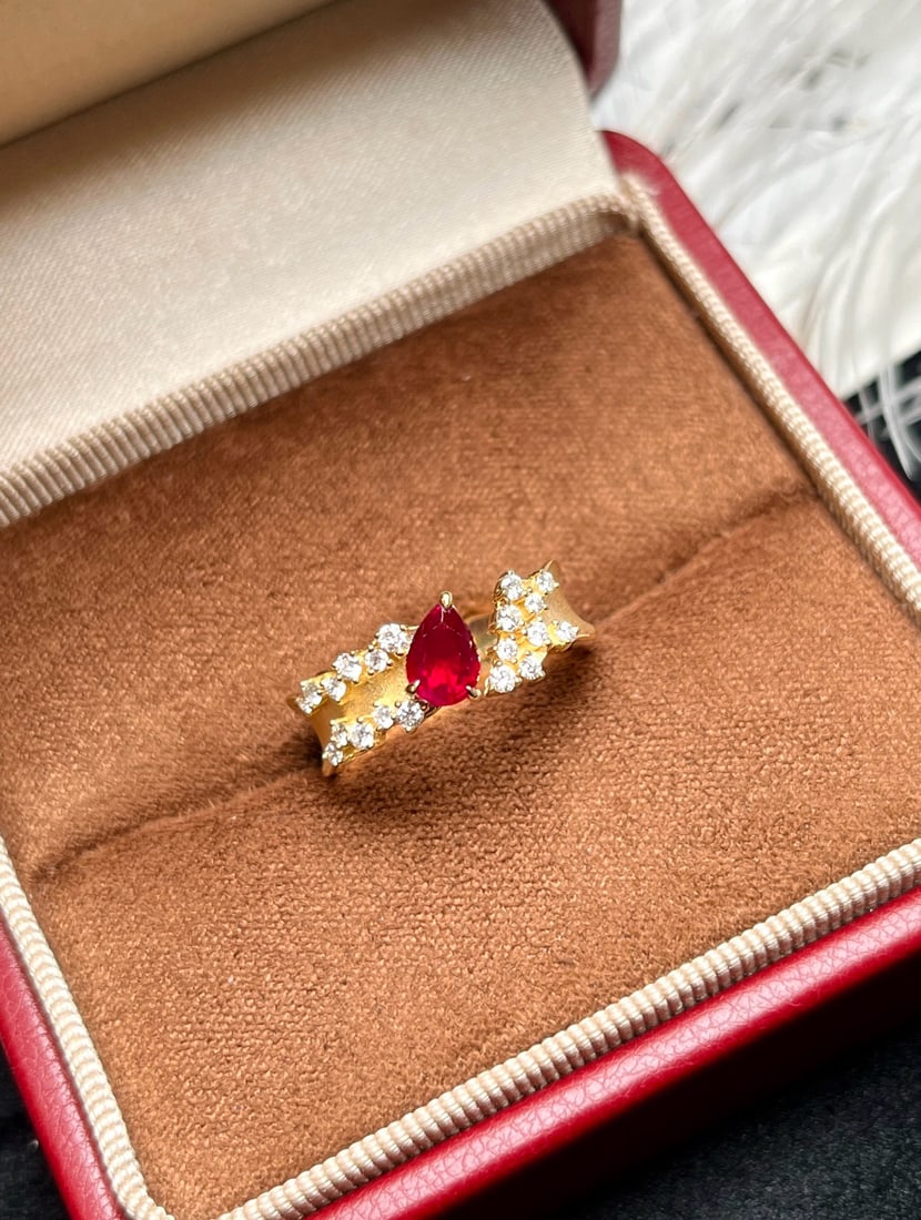 14k Gold 0.68 Ctw Natural Ruby & Diamond Ring: Ref:231082338 // gold content:14k gold // ring size:7. 25us // // main gemstone:ruby // shape:pear // carat weight:0. 45ct // color:pigeonblood red // treatment:natural // // adjacent gemstone 2 : dia