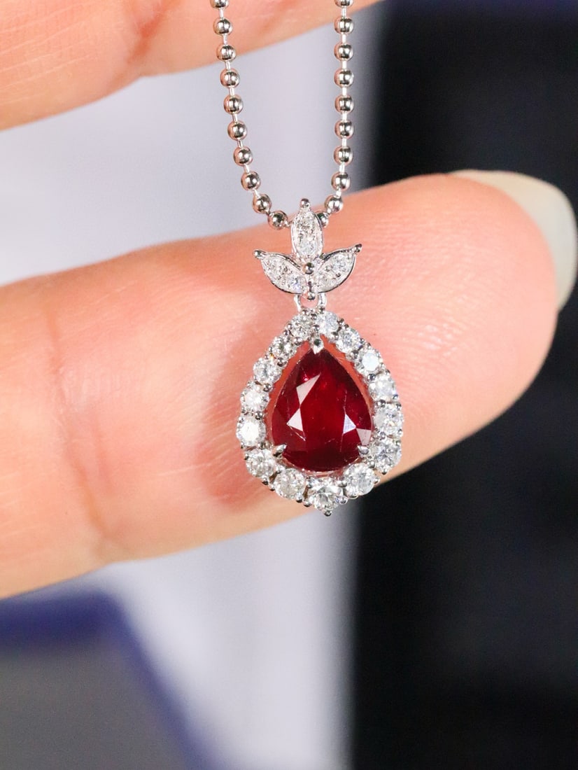 14k Gold 0.95 Ctw Natural Ruby & Diamond Pendant( Without Chain ): Ref:231082348 // gold content:14k gold // main gemstone:ruby // shape:pear // carat weight:0. 72ct // color:pigeonblood red // treatment:natural // // adjacent gemstone 2 : diamond // shape:round //