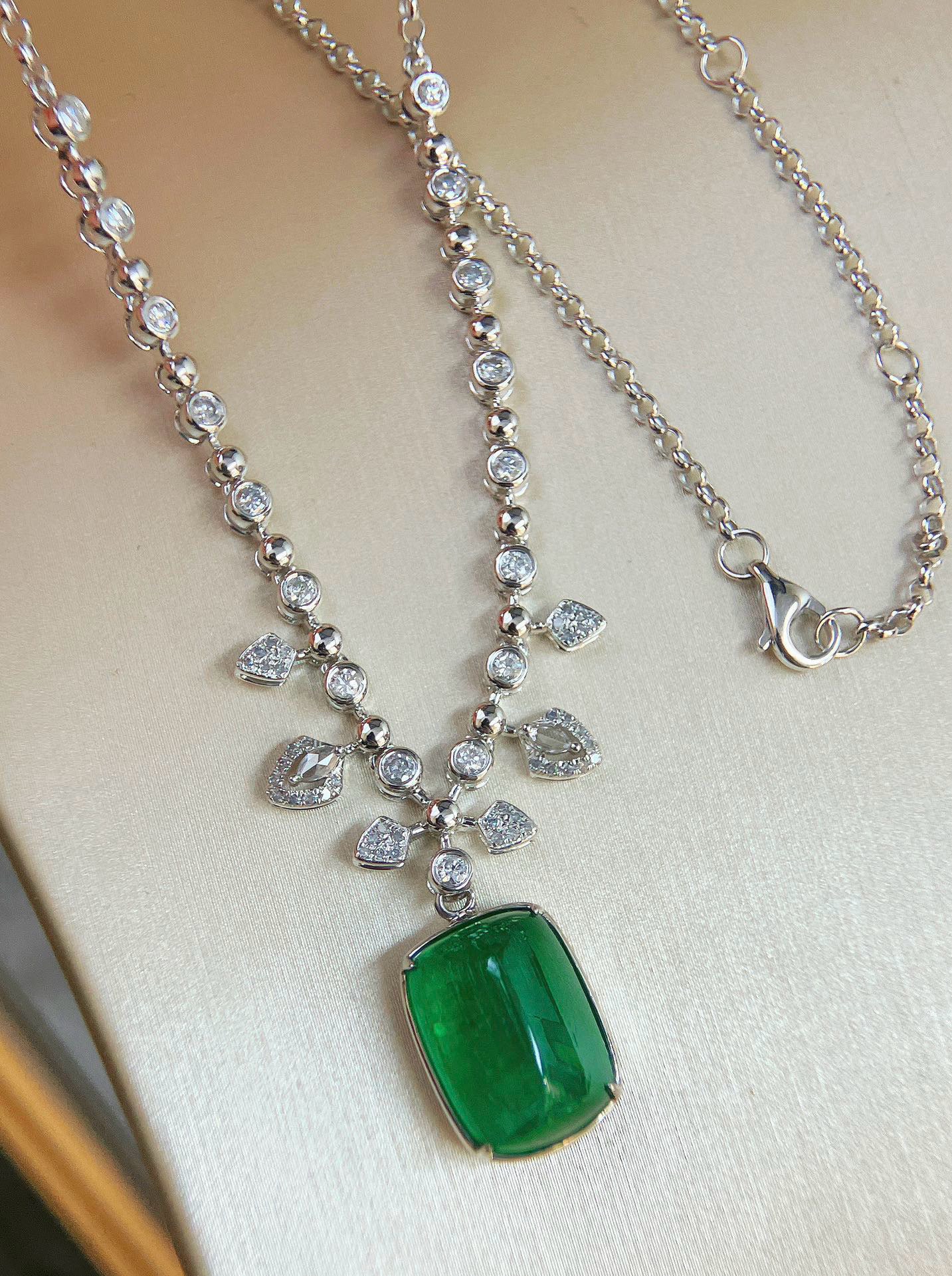 14k Gold 10.36 Ctw Vivid Green Natural Emerald & Diamond Necklace: Ref:231082349 // gold content:14k gold // main gemstone:emerald // shape:sugar-loaf // carat weight:9. 69ct // color:vivid green // treatment:natural // // adjacent gemstone 2 : diamond // shape:multi