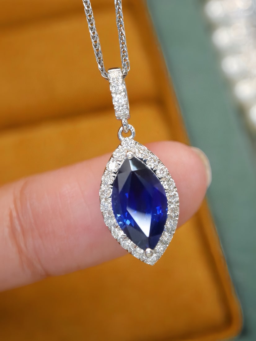 14k Gold 2.14 Ctw Natural Sapphire & Diamond Pendant( Without Chain ): Ref:231082376 // gold content:14k gold // main gemstone:sapphire // shape:marquise // carat weight:1. 90ct // color:royal blue // treatment:natural // // adjacent gemstone 2 : diamond // number of