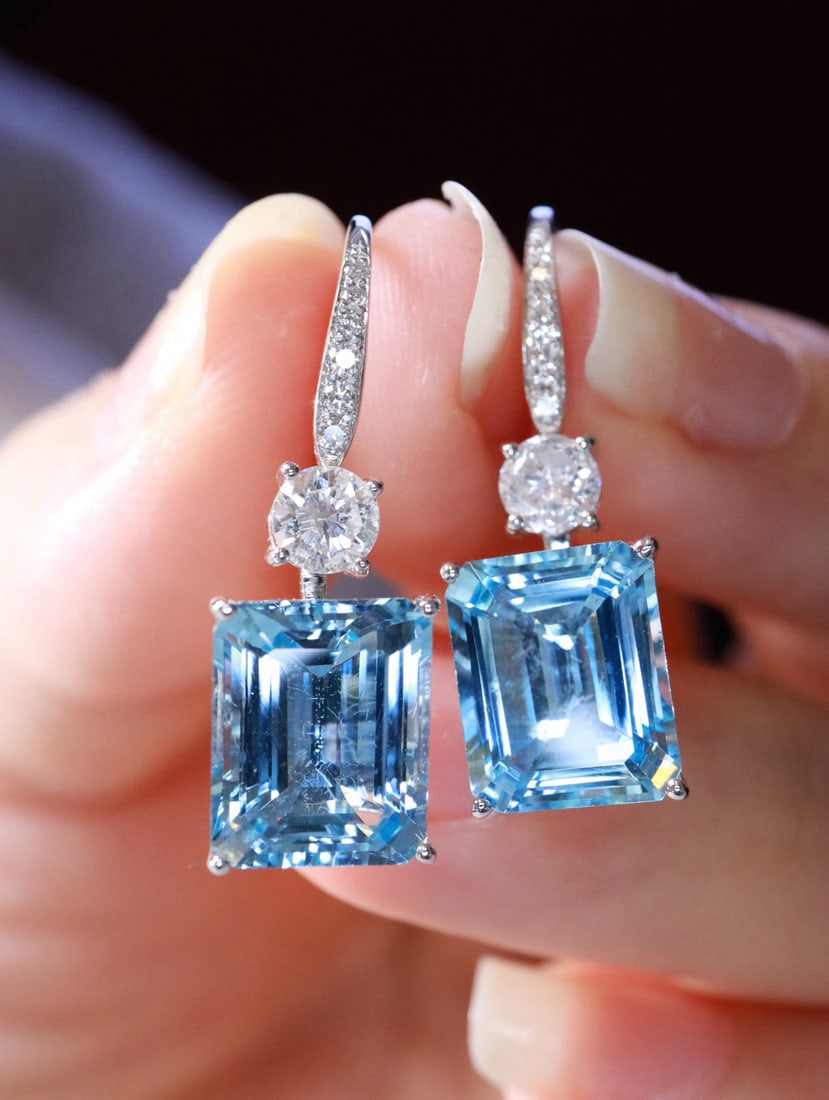 14k Gold 7.11 Ctw Natural Aquamarine & Diamond Earrings: Ref:231082417 // gold content:14k gold // main gemstone:aquamarine // shape:octagonal // carat weight:6. 47ct // color:santa maria color // treatment:natural // // adjacent gemstone 2 : diamond // sha