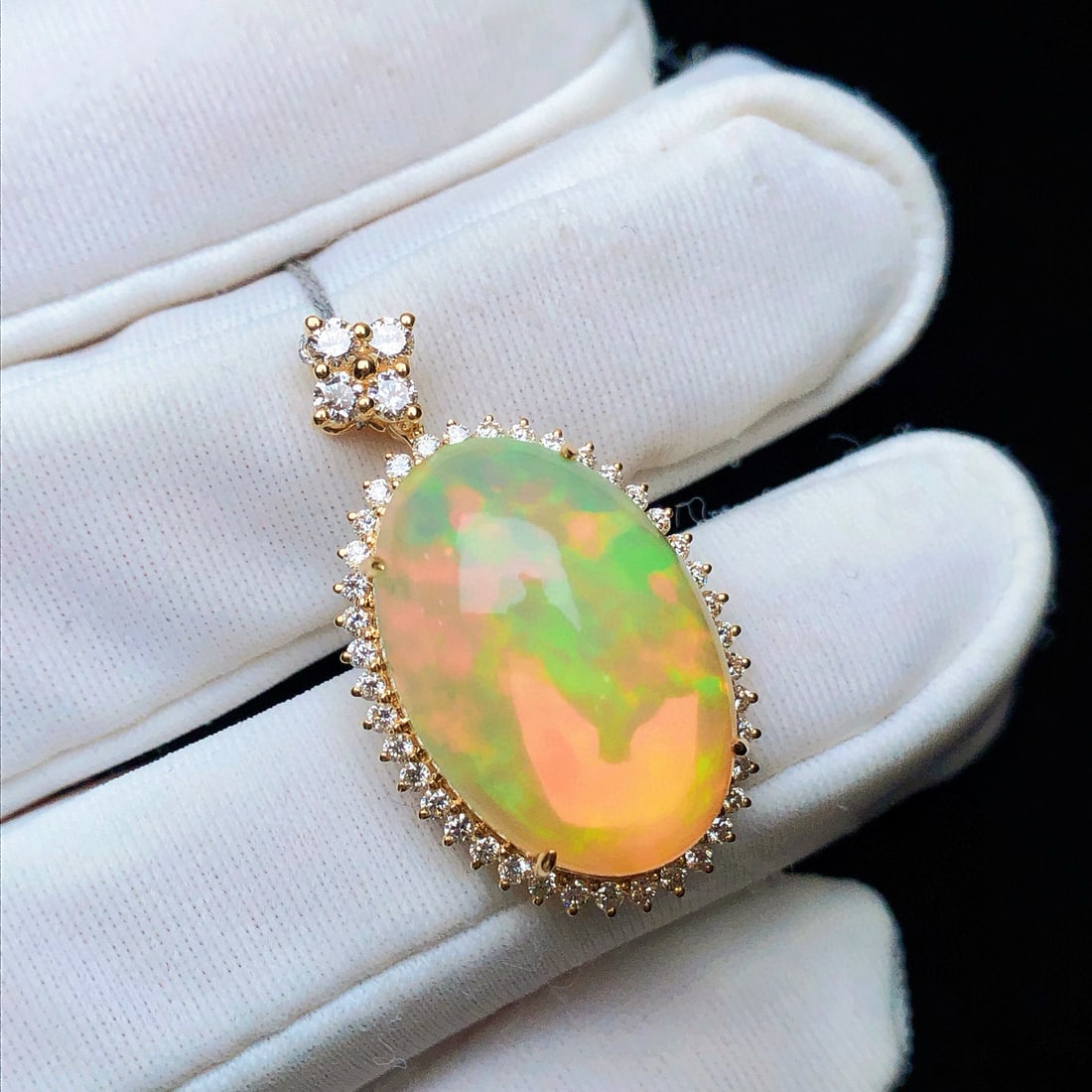 14k Gold 7.48 Ctw Natural Opal & Diamond Pendant( Without Chain ): Ref:231082425 // gold content:14k gold // main gemstone:opal // shape:oval // carat weight:7. 0ct // color:color // treatment:natural // // adjacent gemstone 2 : diamond // shape:round // carat