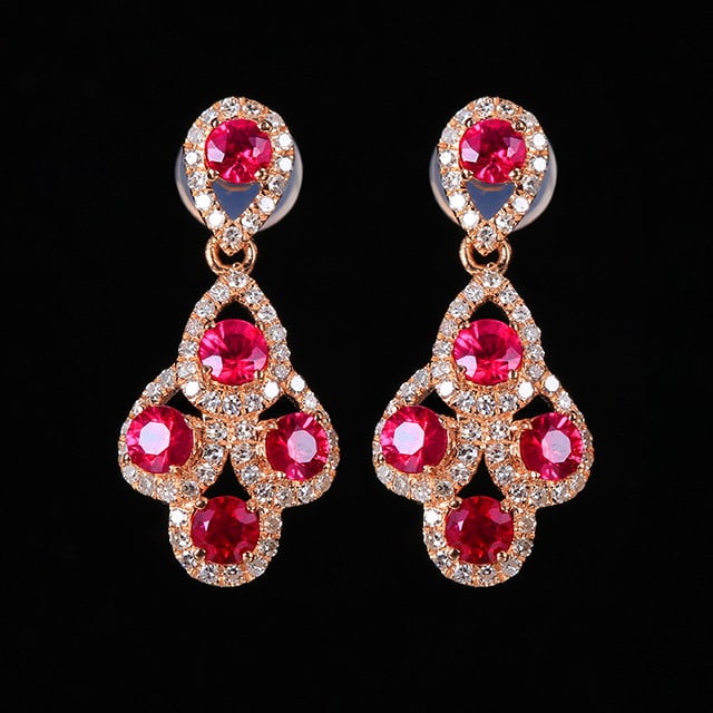 14k Gold 1.66 Ctw Natural Ruby & Diamond Earrings: Ref:231159076 // gold content:14k gold // main gemstone:ruby // shape:round // carat weight:1. 28ct // color:red // treatment:natural // cut grade:g // // adjacent gemstone 2 : diamond // number of