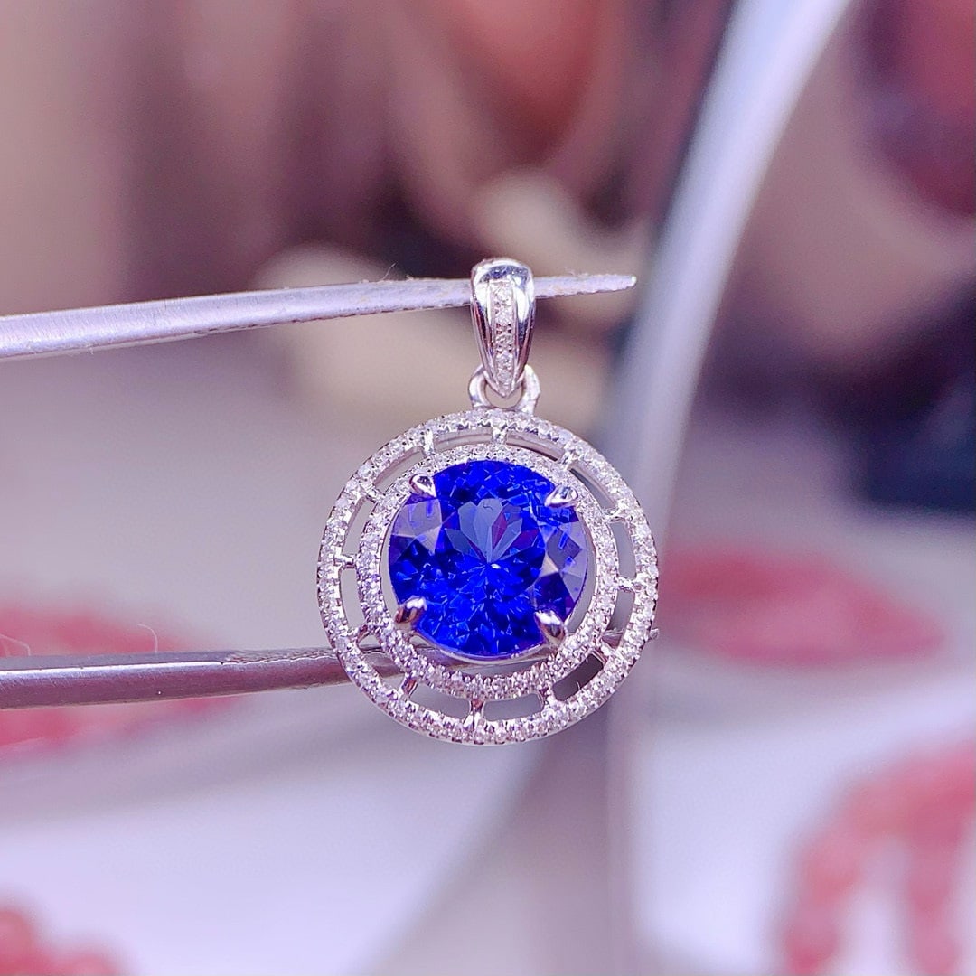 14k Gold 2.5 Ct Natural Tanzanite & Diamond Pendant( Without Chain ): Ref:231159106 // gold content:14k gold // main gemstone:tanzanite // shape:round // carat weight:2. 5ct // color:blue // treatment:natural // cut grade:g // // adjacent gemstone 2 : diamond //