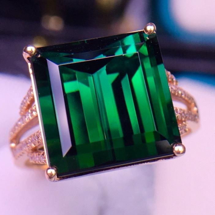 14k Gold 9.5 Ct Natural Tourmaline & Diamond Ring: Ref:231159113 // gold content:14k gold // ring size:7. 25us // // main gemstone:tourmaline // shape:octagonal // carat weight:9. 5ct // color:green // treatment:natural // // adjacent gemstone 2 :