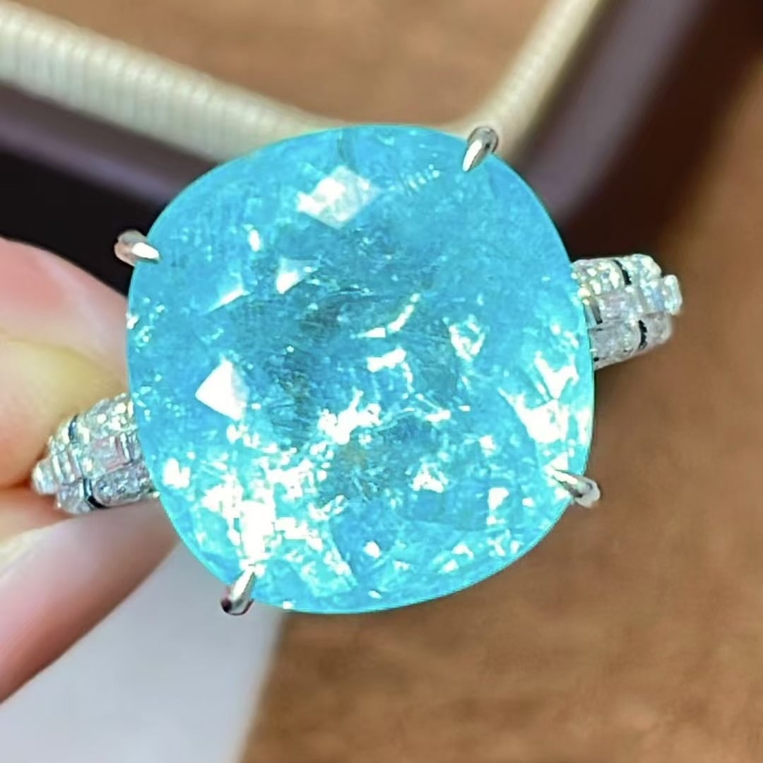 14k Gold 9.6 Ct Natural Paraiba Tourmaline & Diamond Ring: Ref:231159114 // gold content:14k gold // ring size:7. 25us // // main gemstone:paraiba tourmaline // shape:cushion // carat weight:9. 6ct // color:blue // treatment:natural // // adjacent gemstone 2 