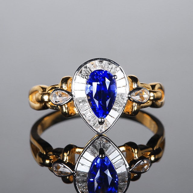 14k Gold 1.35 Ctw Natural Sapphire & Diamond Ring: Ref:231159123 // gold content:14k gold // ring size:7. 25us // // main gemstone:sapphire // shape:pear // carat weight:1. 12ct // color:blue // treatment:natural // // adjacent gemstone 2 : diamond