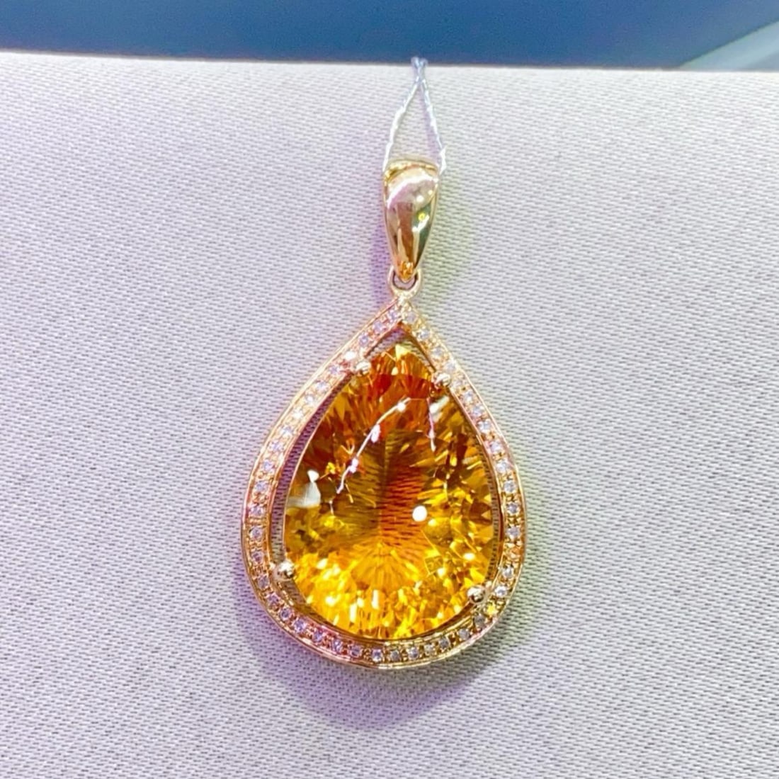 14k Gold 8.23 Ctw Natural Citrine & Diamond Pendant( Without Chain ): Ref:231159215 // gold content:14k gold // main gemstone:citrine // shape:pear // carat weight:8. 1ct // color:yellow // treatment:natural // // adjacent gemstone 2 : diamond // number of stones:45 //