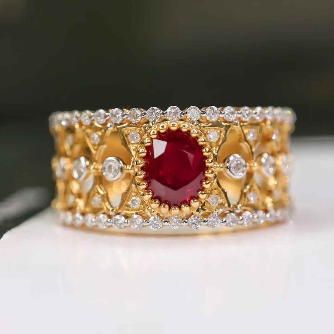 14k Gold 1.37 Ctw Natural Ruby & Diamond Ring: Ref:231160004 // gold content:14k gold // ring size:7. 25us // // main gemstone:ruby // shape:oval // carat weight:0. 9ct // color:pigeonblood red // treatment:natural // // adjacent gemstone 2 :