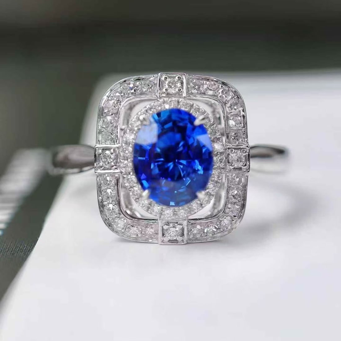 14k Gold 1.25 Ctw Natural Sapphire & Diamond Ring: Ref:231160005 // gold content:14k gold // ring size:7. 25us // // main gemstone:sapphire // shape:oval // carat weight:1. 03ct // color:blue // treatment:natural // // adjacent gemstone 2 : diamond