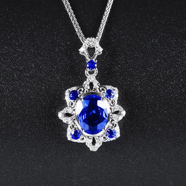 14k Gold 1.02 Ctw Natural Sapphire & Sapphire Pendant( Without Chain ): Ref:231160260 // gold content:14k gold // main gemstone:sapphire // shape:oval // carat weight:0. 88ct // color:blue // treatment:natural // // adjacent gemstone 2 : sapphire // shape:round // carat