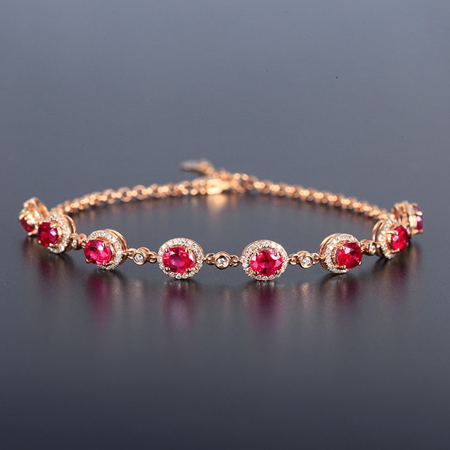14k Gold 3.50 Ctw Natural Ruby & Diamond Bracelet: Ref:231160264 // gold content:14k gold // main gemstone:ruby // shape:oval // carat weight:3ct // color:red // treatment:natural // // adjacent gemstone 2 : diamond // number of stones:151 //