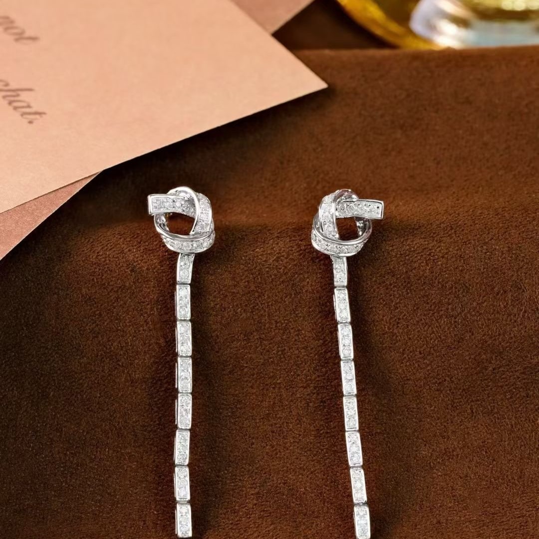 14k Gold 0.5 Ct Natural H Diamond Earrings: Ref:230947152 // gold content:14k gold // main gemstone:diamond // shape:multiply // carat weight:4. 1ct // clarity grade:vs-si // color:h // treatment:natural // Condition: New Low Estimate: 3700.00 