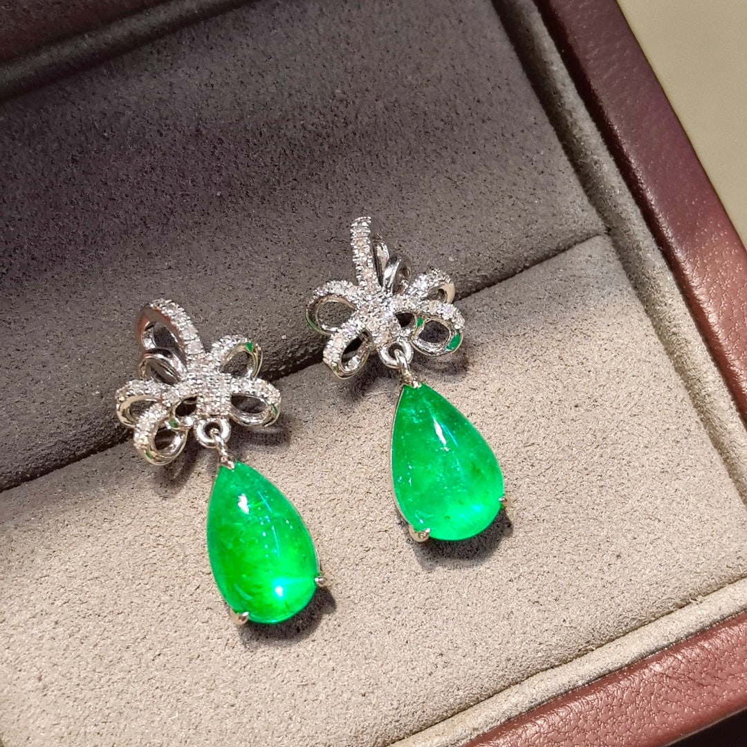 14k Gold 4.8 Ctw Vivid Green Natural Emerald & Diamond Earrings: Ref:230947254 // gold content:14k gold // ring size:7. 25us // // main gemstone:tourmaline // shape:pear // carat weight:1. 8ct // color:green // treatment:natural // // adjacent gemstone 2 : diamond 