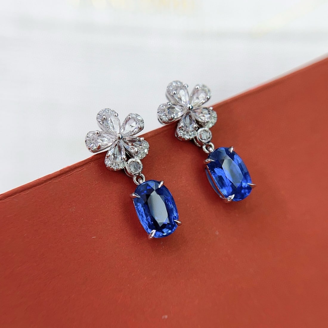 14k Gold 2.25 Ct Natural Sapphire & Diamond & Sapphire Earrings: Ref:231078017 // gold content:14k gold // main gemstone:sapphire // shape:oval // carat weight:2. 25ct // color:blue // treatment:natural // // adjacent gemstone 2 : diamond // number of stones:30 //