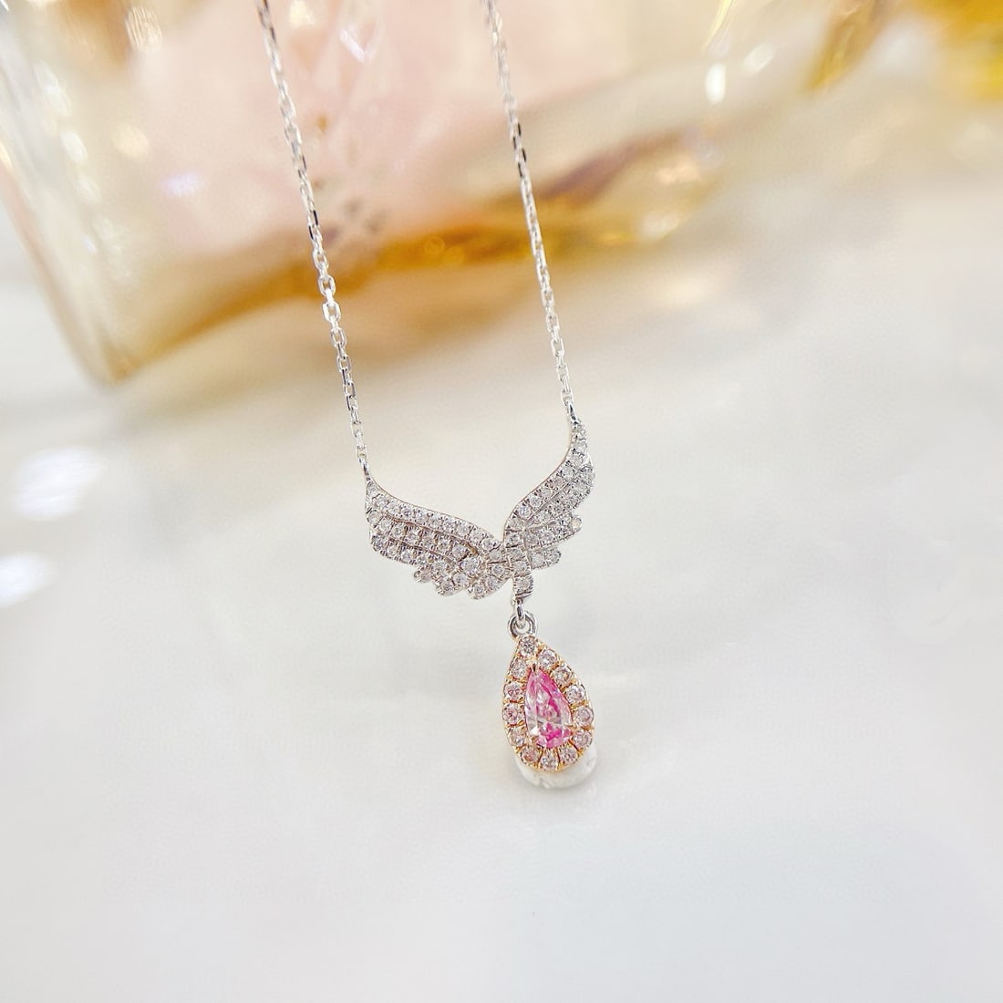 14k Gold 0.27 Ctw Natural Pink Diamond & Diamond Necklace: Ref:231078020 // gold content:14k gold // main gemstone:pink diamond // shape:pear // carat weight:0. 10ct // color:pink // treatment:natural // // adjacent gemstone 2 : diamond // shape:round //