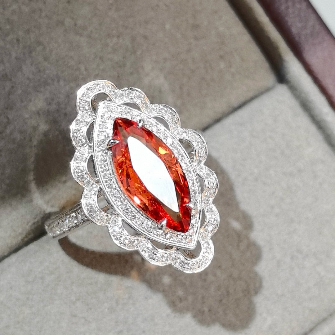 14k Gold 2.21 Ctw Natural Spinel & Diamond Ring: Ref:231078032 // gold content:14k gold // ring size:7. 25us // // main gemstone:spinel // shape:marquise // carat weight:1. 76ct // color:orange // treatment:natural // // adjacent gemstone 2 :