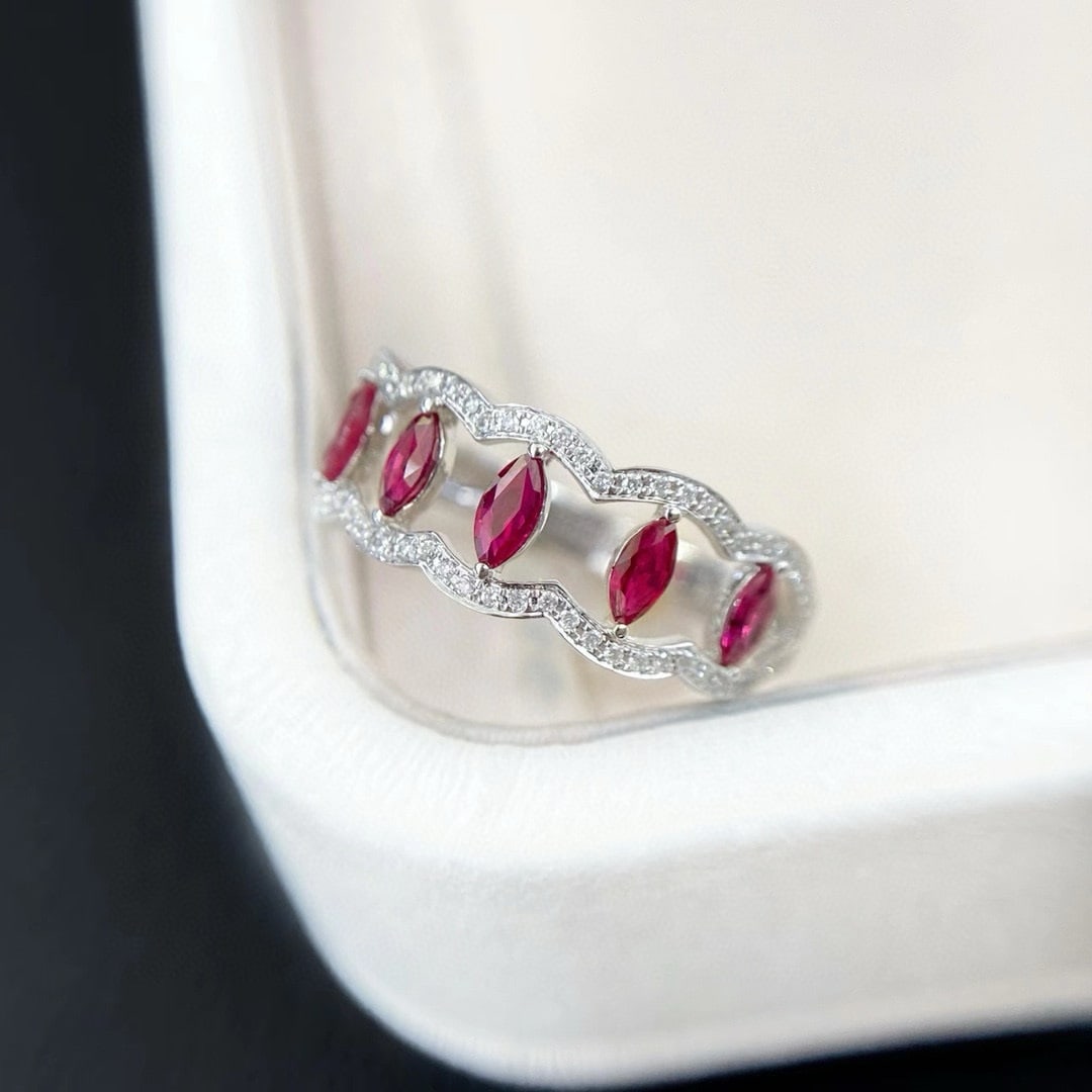 14k Gold 0.69 Ctw Natural Ruby & Diamond Ring: Ref:231078071 // gold content:14k gold // ring size:7. 25us // // main gemstone:ruby // shape:marquise // carat weight:0. 57ct // color:red // treatment:natural // // adjacent gemstone 2 : diamond //
