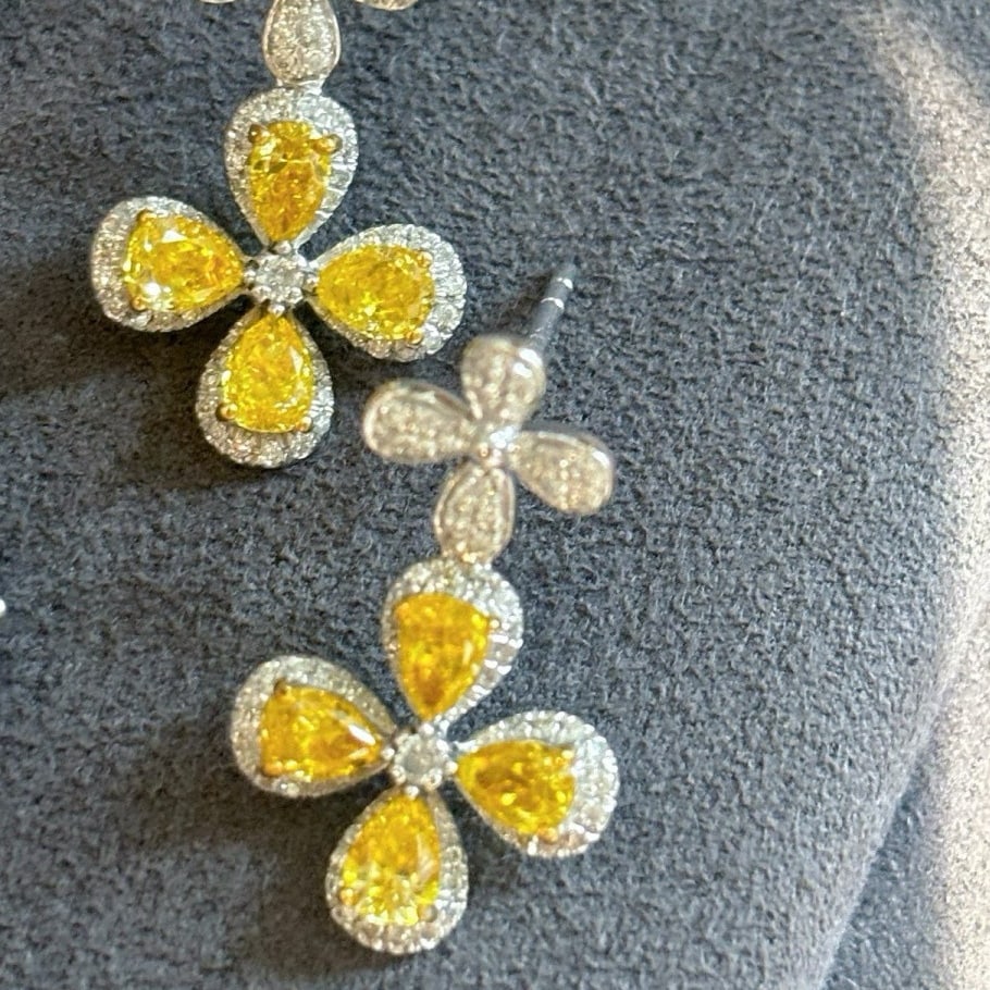 14k Gold 1.3 Ct Natural Color Diamond Earrings: Ref:231078074 // gold content:14k gold // main gemstone:diamond // shape:multiple // carat weight:1. 3ct // clarity grade:vs-si // color:color // treatment:natural // Condition: New Low Estimate: 3500