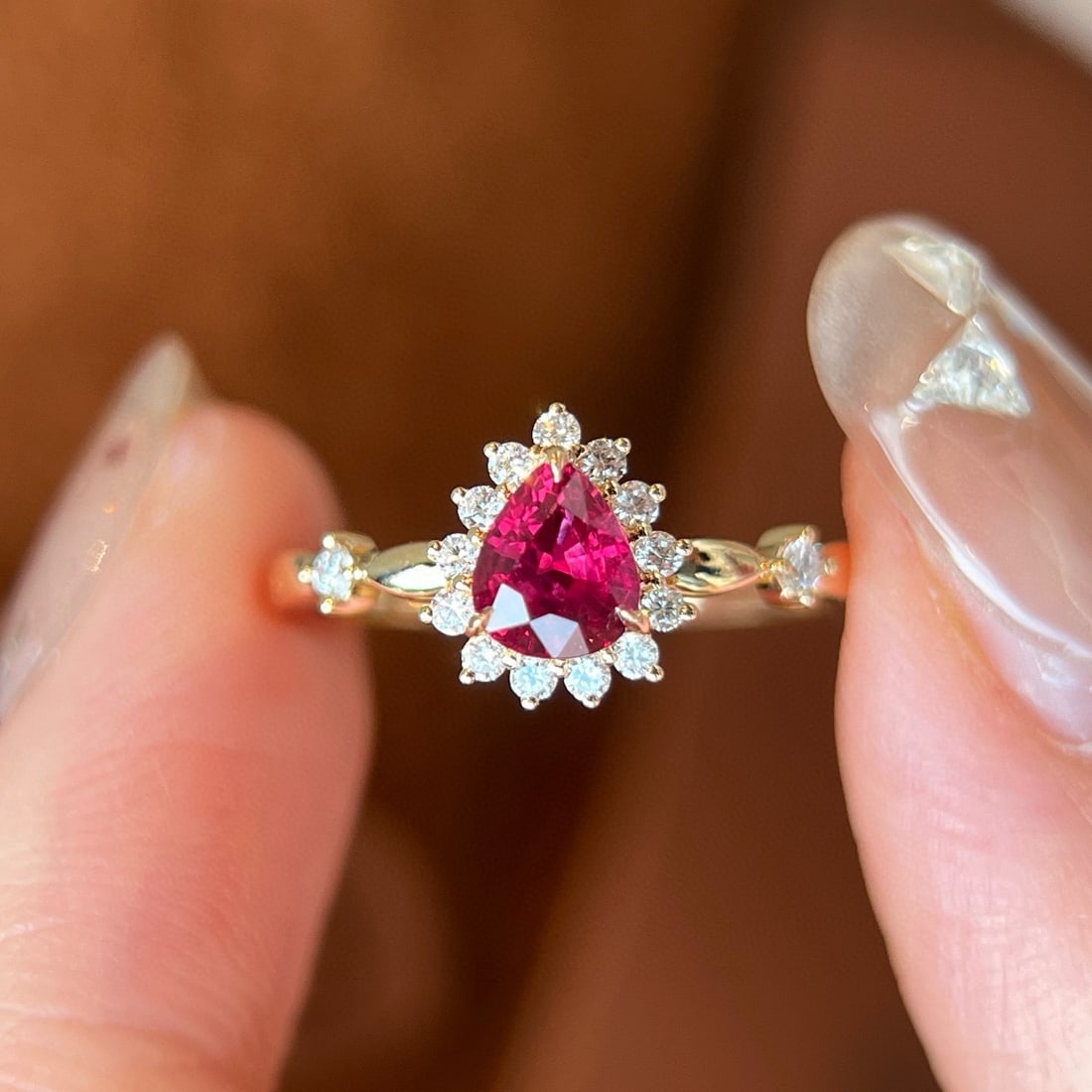 14k Gold 0.73 Ctw Natural Ruby & Diamond Ring: Ref:231078078 // gold content:14k gold // ring size:7. 25us // // main gemstone:ruby // shape:pear // carat weight:0. 57ct // color:red // treatment:natural // // adjacent gemstone 2 : diamond //