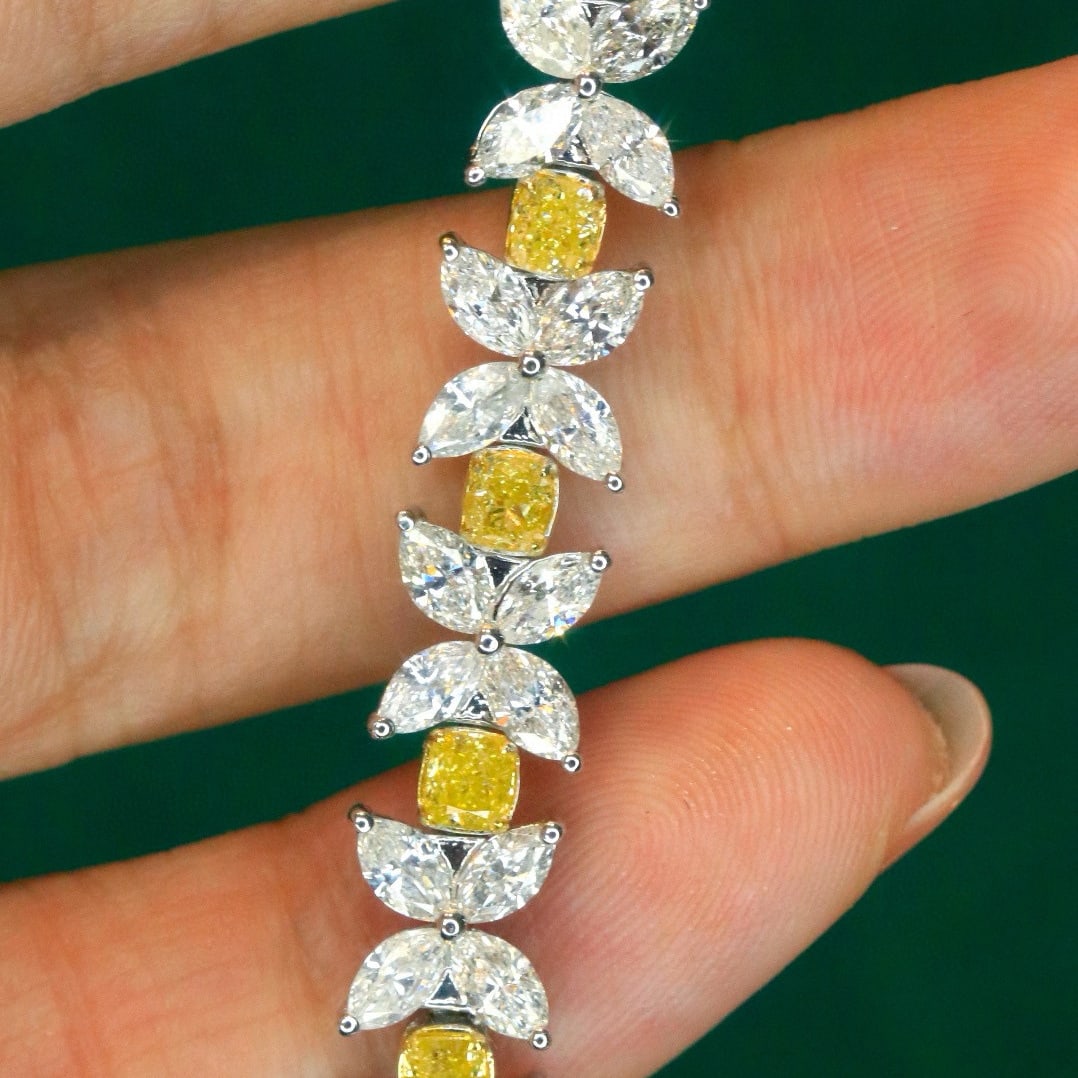14k Gold 9.3 Ct Natural Color Diamond Bracelet: Ref:231078115 // gold content:14k gold // main gemstone:diamond // shape:multiple // carat weight:9. 3ct // clarity grade:vs-si // color:color // treatment:natural // Condition: New Low Estimate: