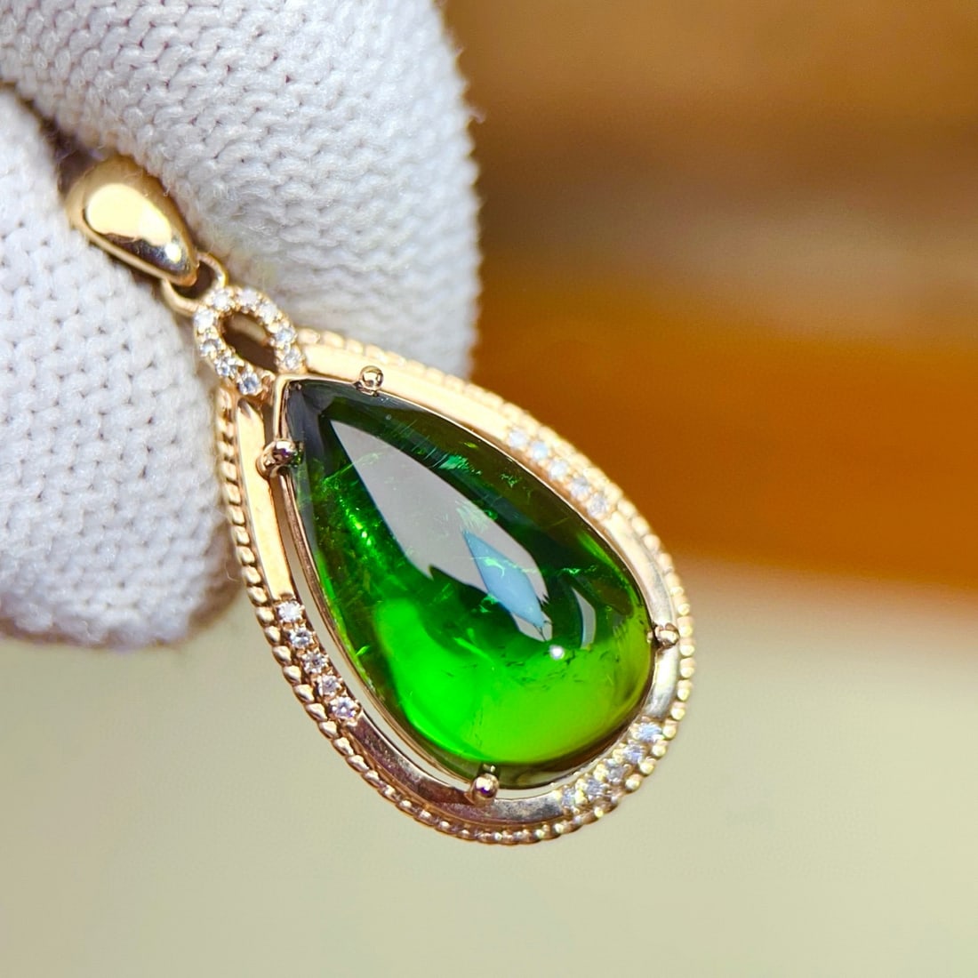 14k Gold 8.30 Ctw Natural Tourmaline & Diamond Pendant( Without Chain ): Ref:231078223 // gold content:14k gold // main gemstone:tourmaline // shape:pear // carat weight:8. 23ct // color:green // treatment:natural // // adjacent gemstone 2 : diamond // number of stones:24