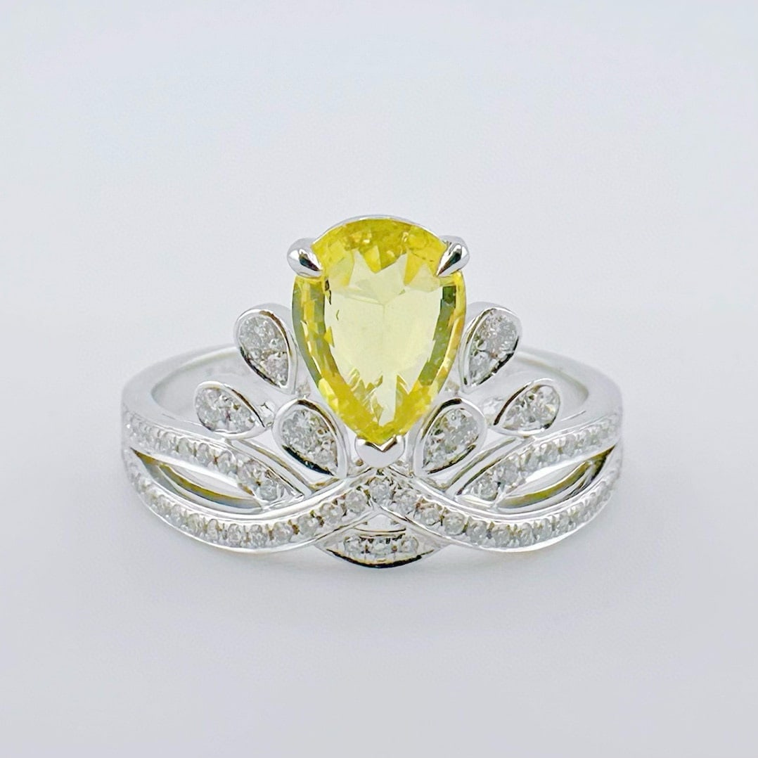 14k Gold 1.28 Ctw Natural Sapphire & Diamond Ring: Ref:231078319 // gold content:14k gold // ring size:7. 25us // // main gemstone:sapphire // shape:pear // carat weight:1. 04ct // color:yellow // treatment:natural // // adjacent gemstone 2 : diamond