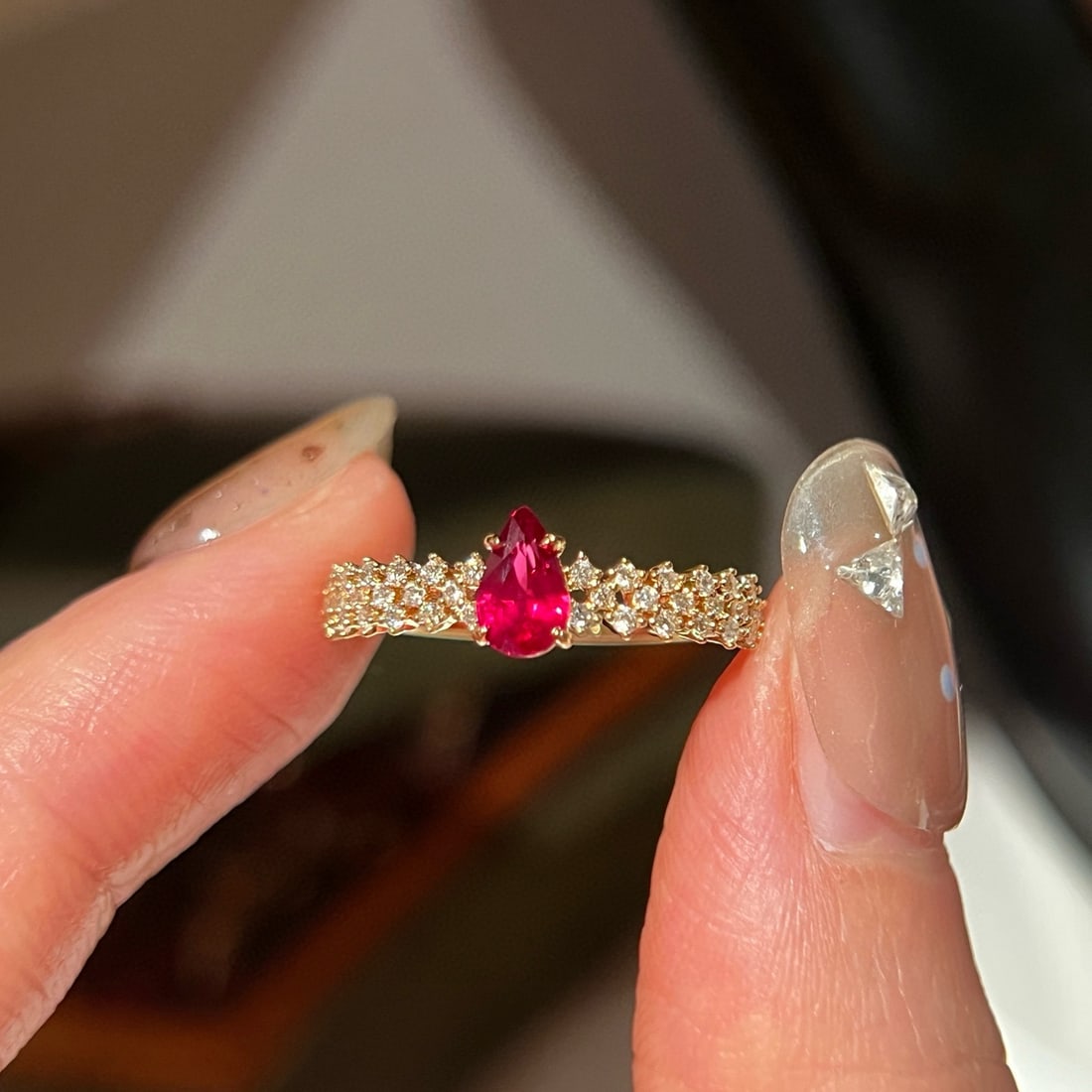 14k Gold 0.64 Ctw Natural Ruby & Lab Grown Diamond Ring: Ref:231078400 // gold content:14k gold // ring size:7. 25us // // main gemstone:ruby // shape:pear // carat weight:0. 45ct // color:red // treatment:natural // // adjacent gemstone 2 : lab grown diamo