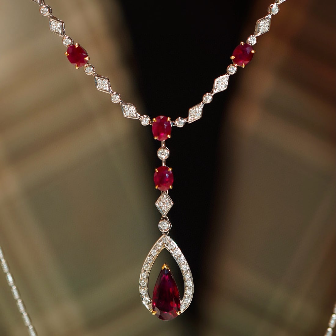 14k Gold 3.23 Ctw Natural Ruby & Ruby Necklace: Ref:231078414 // gold content:14k gold // main gemstone:ruby // shape:pear // carat weight:1. 03ct // color:pigeonblood red // treatment:natural // // adjacent gemstone 2 : ruby // shape:oval // carat