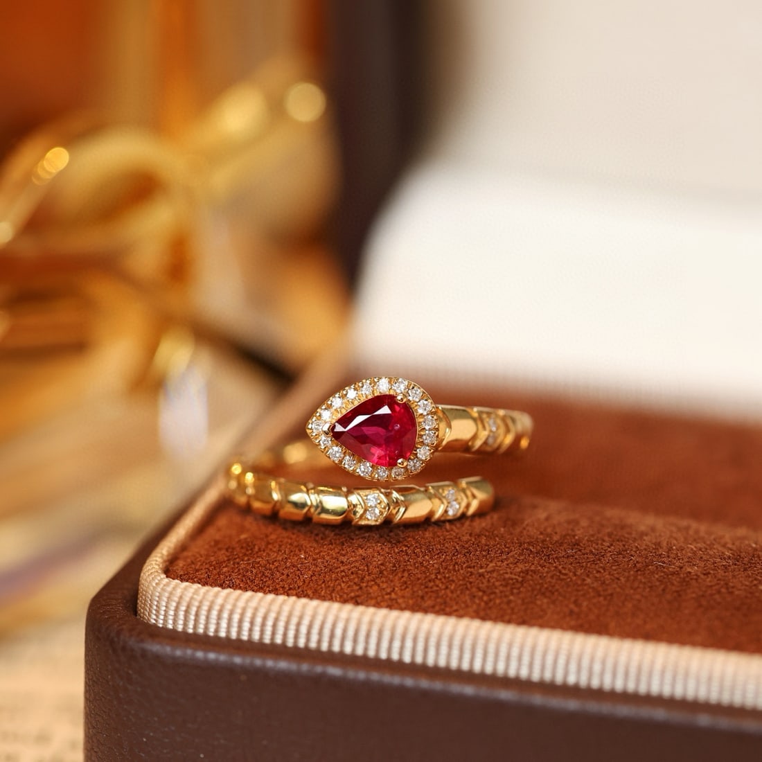 14k Gold 0.87 Ctw Natural Ruby & Diamond Ring: Ref:231078445 // gold content:14k gold // ring size:7. 25us // // main gemstone:ruby // shape:pear // carat weight:0. 75ct // color:pigeonblood red // treatment:natural // // adjacent gemstone 2 :