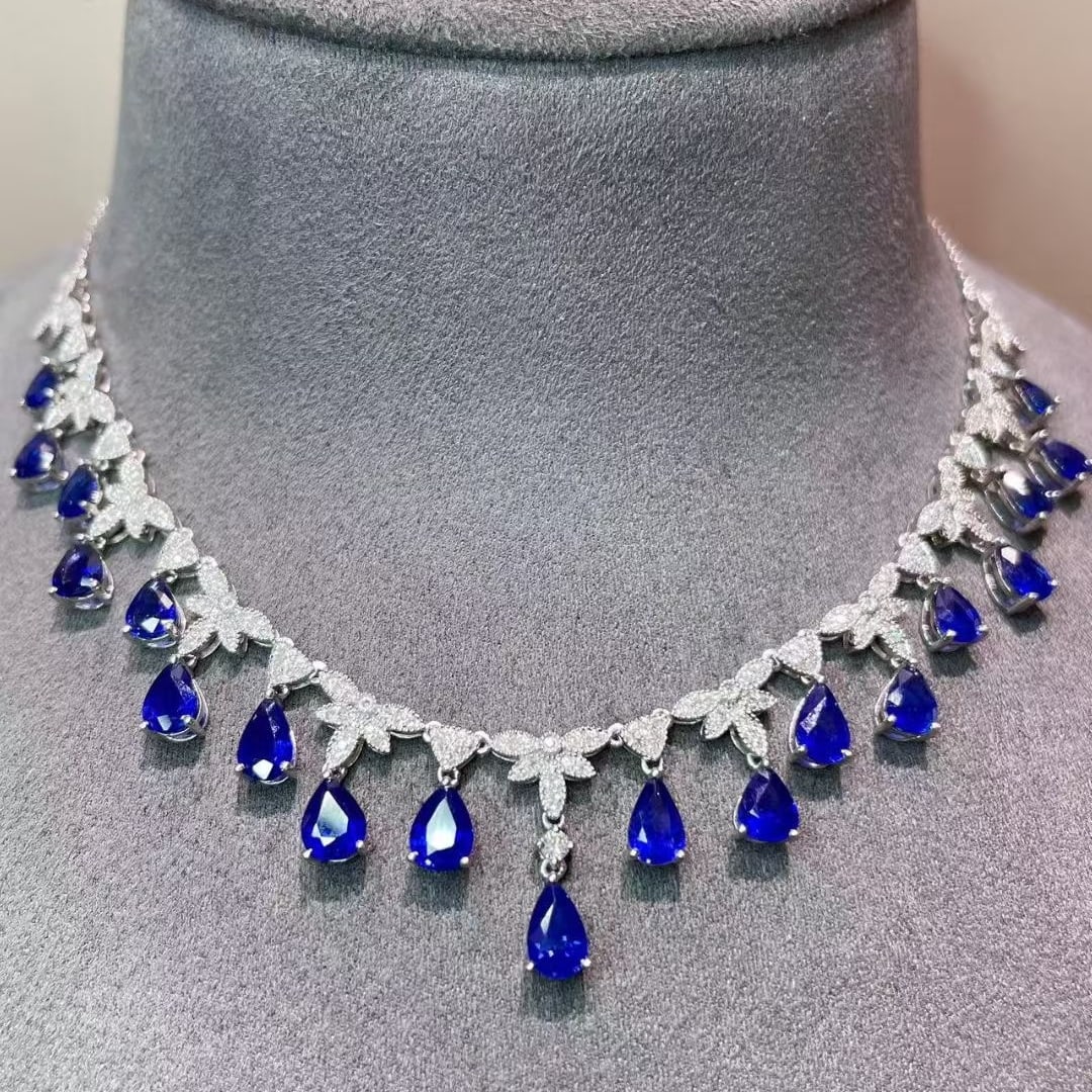 14k Gold 7 Ct Natural Sapphire & Diamond Necklace: Ref:231079026 // gold content:14k gold // main gemstone:sapphire // shape:pear // carat weight:7ct // color:blue // treatment:natural // // adjacent gemstone 2 : diamond // shape:round // clarity