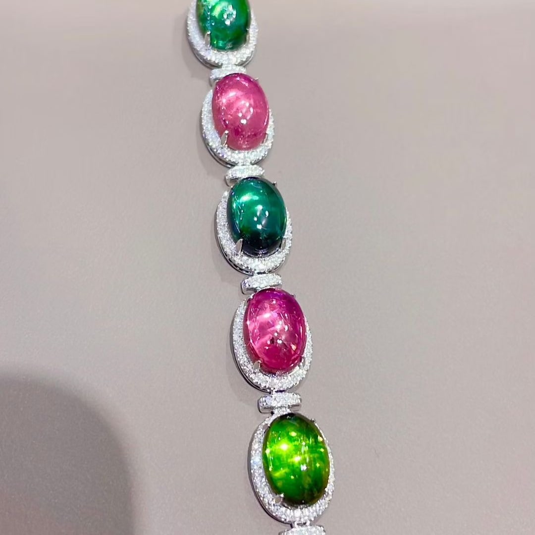 14k Gold 26.3 Ct Natural Tourmaline & Diamond Bracelet: Ref:231079047 // gold content:14k gold // main gemstone:tourmaline // shape:oval // carat weight:26. 3ct // color:color // treatment:natural // // adjacent gemstone 2 : diamond // shape:round //