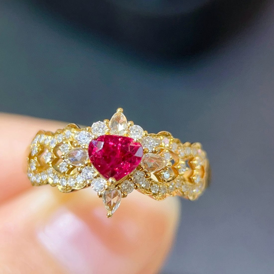 14k Gold 0.87 Ctw Natural Ruby & Diamond Ring: Ref:231079065 // gold content:14k gold // ring size:7. 25 us // // main gemstone:ruby // shape:pear // carat weight:0. 6ct // color:red // treatment:natural // // adjacent gemstone 2 : diamond //