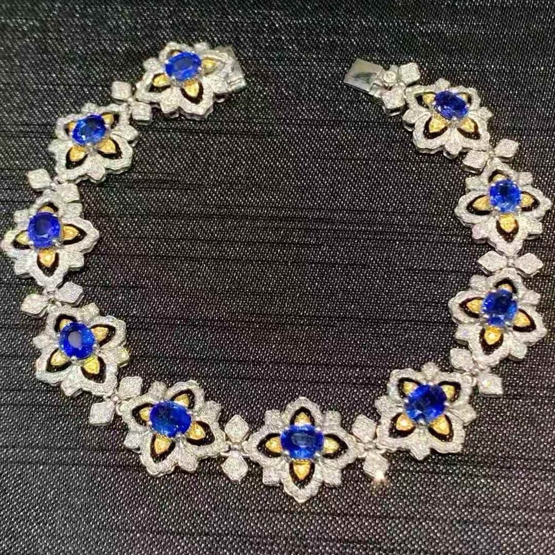 14k Gold 7.2 Ct Natural Sapphire & Color Diamond Bracelet: Ref:231079068 // gold content:14k gold // main gemstone:sapphire // shape:oval // carat weight:7. 2ct // color:blue // treatment:natural // // adjacent gemstone 2 : color diamond // number of