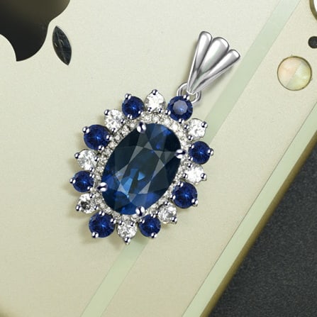 14k Gold 4.32 Ctw Natural Sapphire & Diamond & Sapphire Pendant( Without Chain ): Ref:231079096 // gold content:14k gold // main gemstone:sapphire // shape:oval // carat weight:3. 91ct // color:blue // treatment:natural // // adjacent gemstone 2 : diamond // number of stones:27 //