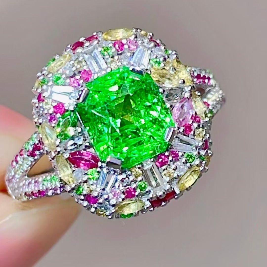 14k Gold 2.56 Ct Natural Tsavorite & Coloured Gemstone Ring: Ref:231079130 // gold content:14k gold // ring size:7. 25 us // // main gemstone:tsavorite // shape:octagonal // carat weight:2. 56ct // color:green // treatment:natural // // adjacent gemstone 2 : co