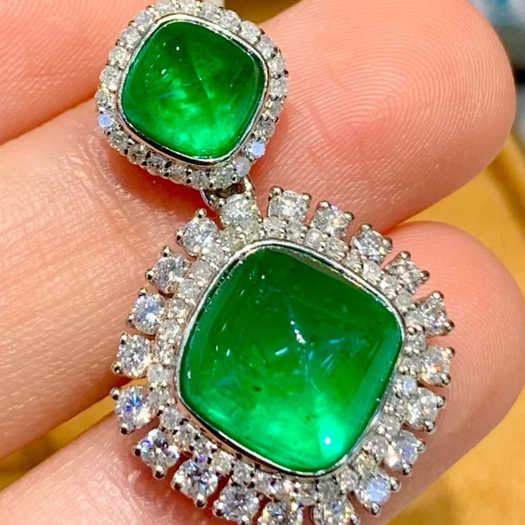 14k Gold 5.56 Ct Natural Emerald & Diamond Pendant( Without Chain ): Ref:231079141 // gold content:14k gold // main gemstone:emerald // number of stones:2 // shape:sugar-loaf // carat weight:5. 56ct // color:green // treatment:natural // // adjacent gemstone 2 : diamon