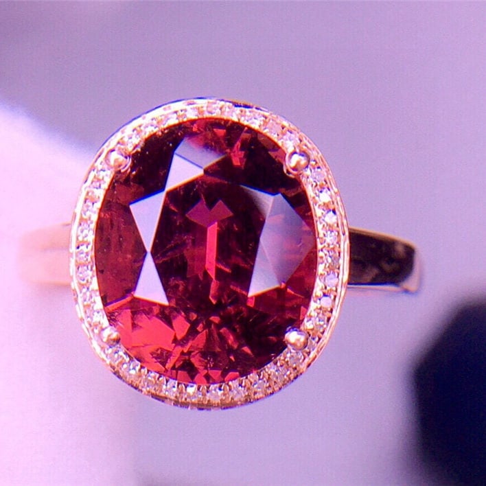 14k Gold 4.5 Ct Natural Tourmaline & Diamond Ring: Ref:231079199 // gold content:14k gold // ring size:7. 25 us // // main gemstone:tourmaline // shape:oval // carat weight:4. 5ct // color:red // treatment:natural // // adjacent gemstone 2 : diamond