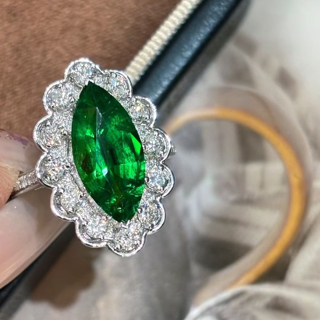 14k Gold 3.47 Ct Natural Tsavorite & Diamond Ring: Ref:231079209 // gold content:14k gold // ring size:7. 25 us // // main gemstone:tsavorite // shape:marquise // carat weight:3. 47ct // color:green // treatment:natural // // adjacent gemstone 2 :