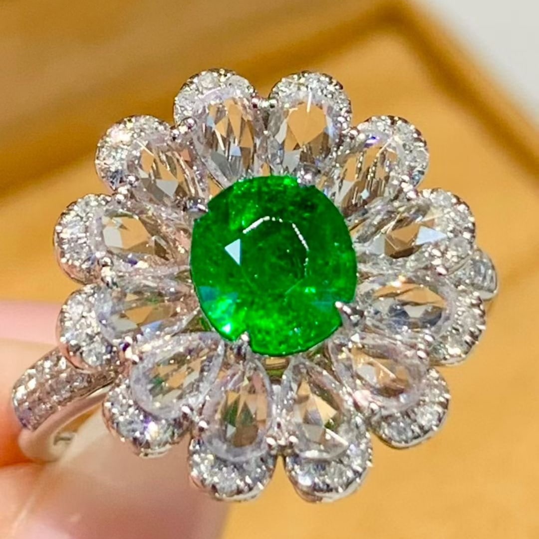 14k Gold 1.1 Ct Natural Tsavorite & Sapphire & Diamond Ring: Ref:231079244 // gold content:14k gold // ring size:7. 25 us // // main gemstone:tsavorite // shape:oval // carat weight:1. 1ct // color:green // treatment:natural // // adjacent gemstone 2 :